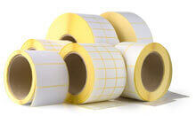Plain self adhesive labels on a roll
